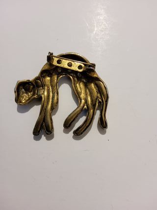 Spilla a forma di leopardo dorato