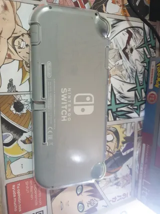 Nintendo Switch Lite Plata + Caja y Cargador