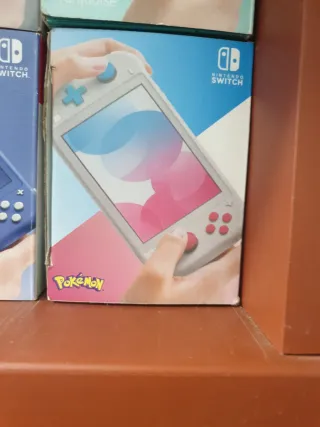 Nintendo Switch Lite Plata + Caja y Cargador