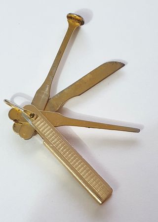 Curapipe tre in uno vintage in ottone