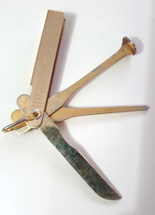 Curapipe tre in uno vintage in ottone