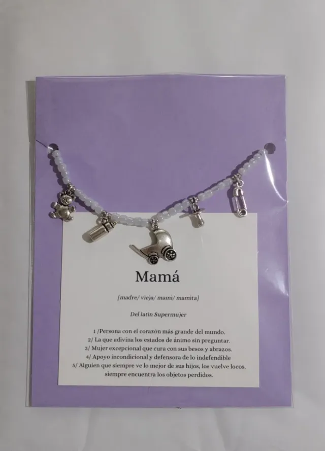 Pulsera Mamá con dijes de bebé