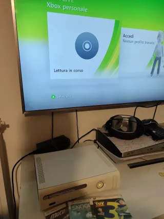 Xbox 360 White + Giochi toy story3 Moto - Snoopy