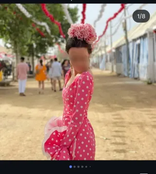 Traje de flamenca rosa lunares cola larga