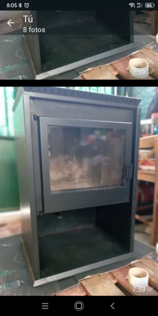 Chimenea metálica con puerta de cristal