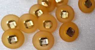 Lote 15 botones- 9 colores