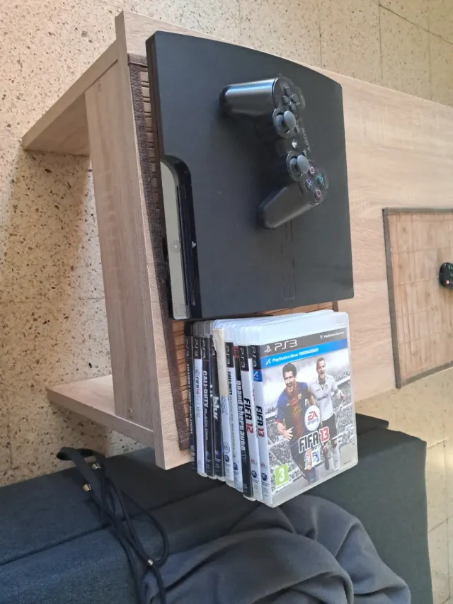 PlayStation 3 + Mando + 9 Juegos