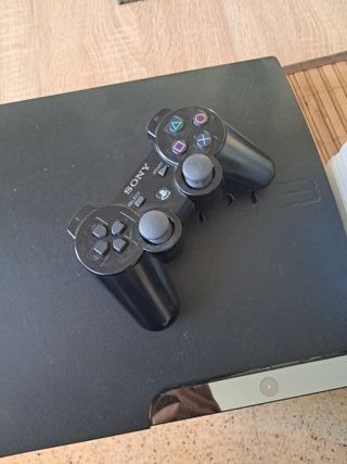 PlayStation 3 + Mando + 9 Juegos