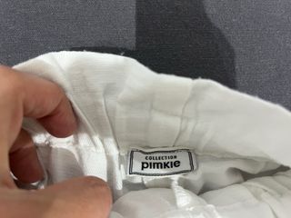 Falda pantalón blanca con cinturón. solo envío