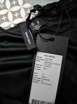 Blusa de cóctel negra con textura