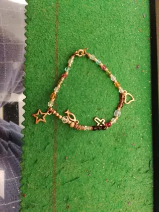 Pulsera mujer con dijes y cuentas