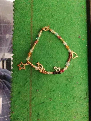 Pulsera mujer con dijes y cuentas