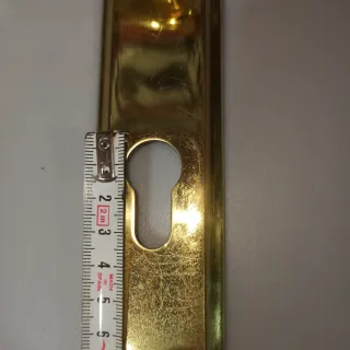Manilla de puerta dorada con bocallave dé 85mm