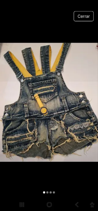 Peto corto vaquero desgastado