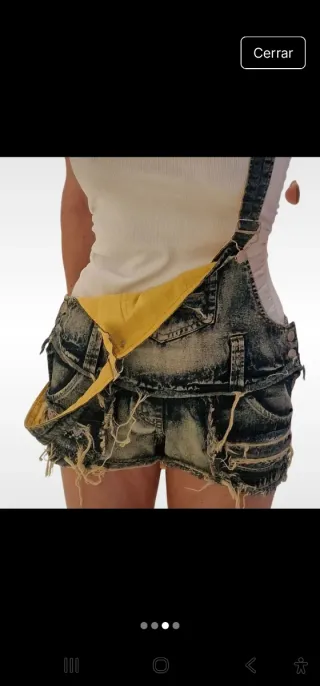 Peto corto vaquero desgastado