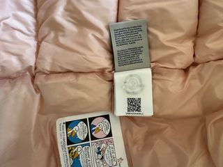 Chaqueta de plumas iridiscente