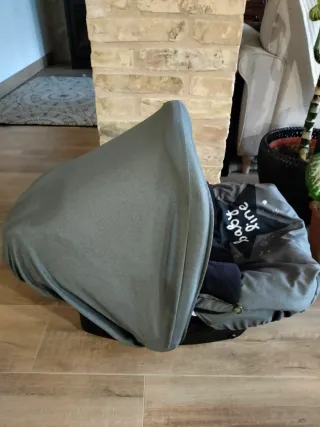 Maxi-Cosi con adaptador y funda invierno