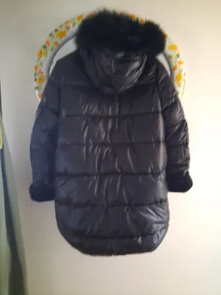 Pelliccia nera double face con cappuccio