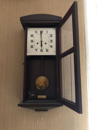 Pendolo vintage in legno e vetro