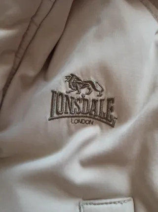 Giubbotto beige con cappuccio