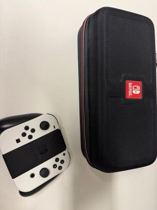 Nintendo switch OLED + 3juegos y 2 mandos Joy-cons