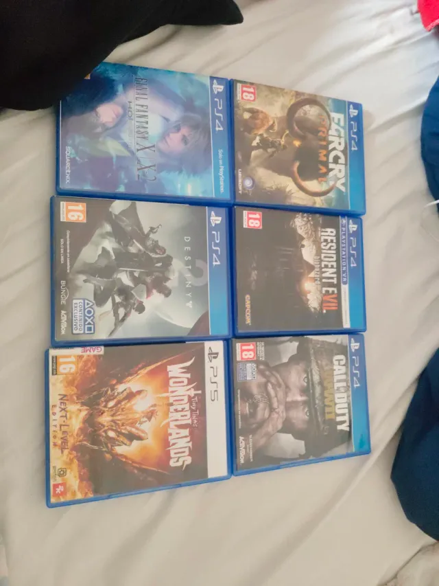 PS5 con lector + 2 mandos (1 mes) + 6 juegos