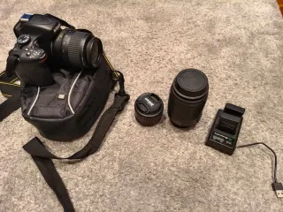 Cámara nikon d5100 mas tres objetivos funda bateri