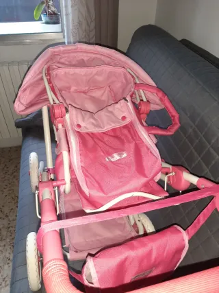 Carrito y silla de muñecas rosa