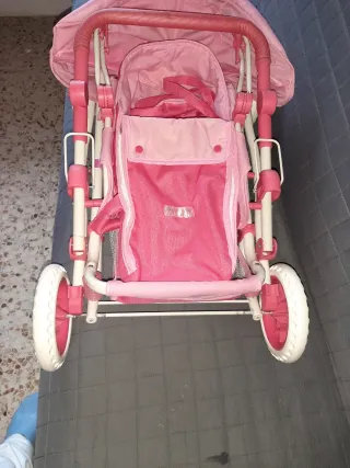 Carrito y silla de muñecas rosa
