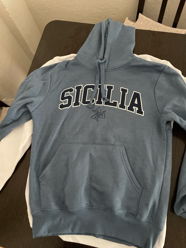 Sudadera blanca University of Michigan y Sicilia