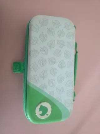 Nintendo Switch Lite Coral + Custodia + 7 Giochi