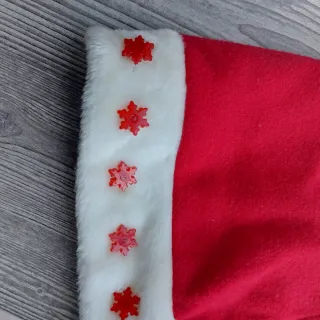 Cappello Babbo Natale rosso con fiocchi