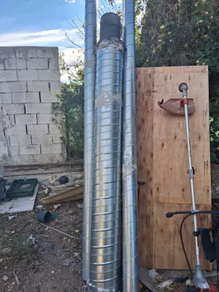 Chimenea metálica con cristal