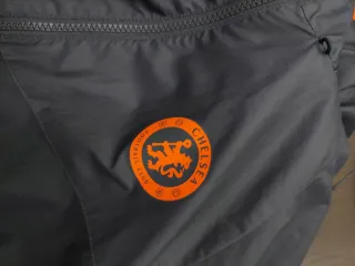 Chaqueta Chelsea Nike Negra y Naranja