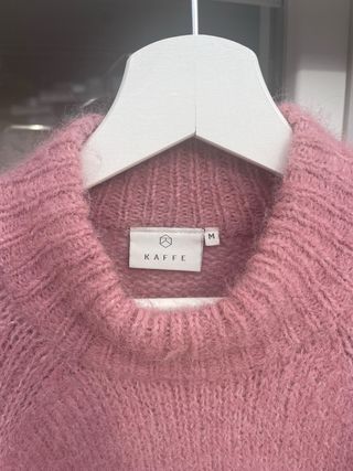 Jersey rosa cuello alto