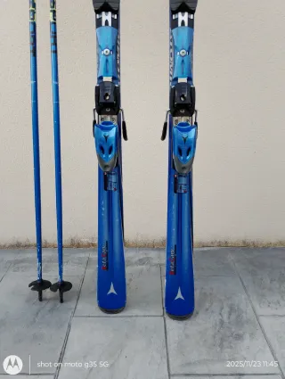 Esquís Atomic 180 cm + Bastones y Bolsa