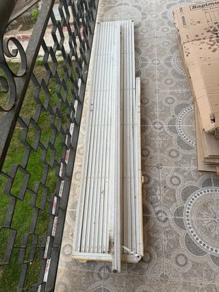 Puerta extensible metálica