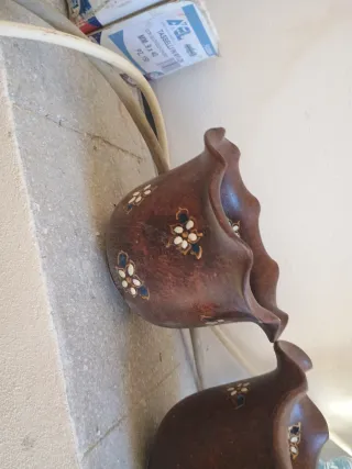 Coppe in terracotta decorate