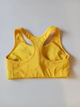 Top deportivo Nike amarillo talla S