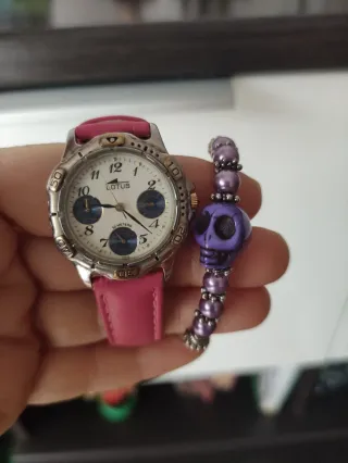 Reloj Lotus y Pulsera Calavera Morada