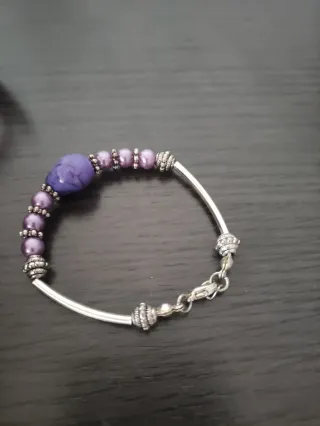 Reloj Lotus y Pulsera Calavera Morada