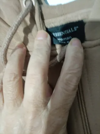 Chaqueta beige con capucha talla S unisex