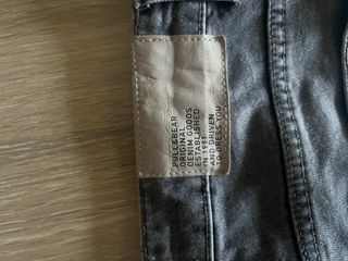 Pantalón vaquero gris desgastado