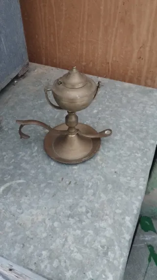 Candelabro de mecha antiguo