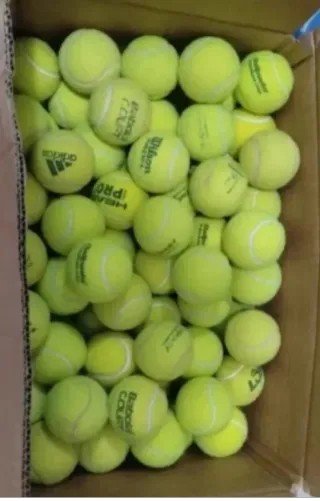 50 pelotas de pádel usadas