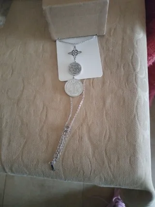 Collar triple protección San Benito, Tetragrámaton