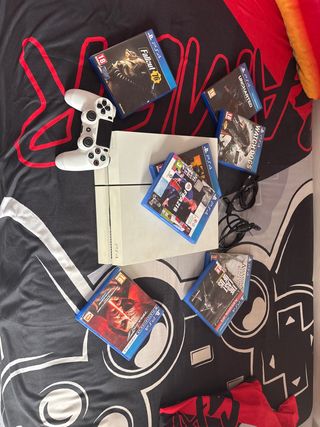 PS4 Blanca + Mando + 8 Juegos se entrega en mano