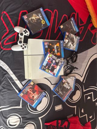 PS4 Blanca + Mando + 8 Juegos se entrega en mano