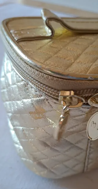 Pochette oro effetto trapuntato