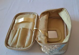 Pochette oro effetto trapuntato